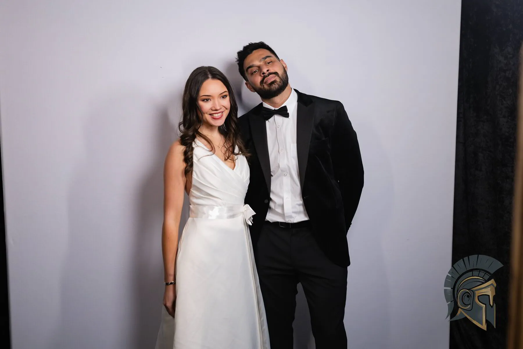 Bride and groom posing at the Spartacus Wedding Photo Booth